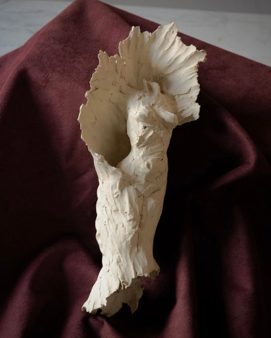 Unglazed Female Form Wall Sculpture with Crest
